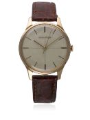 A GENTLEMAN'S 18K SOLID PINK GOLD JAEGER LECOULTRE WRIST WATCH CIRCA 1960s D: Silver cross hair dial