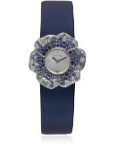 A LADIES 18K SOLID WHITE GOLD WITH DIAMONDS & SAPPHIRES CHANEL CAMELIA WRIST WATCH DATED 2011,