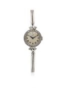 A LADIES 9CT SOLID WHITE GOLD & DIAMOND ROLEX TUDOR COCKTAIL WATCH CIRCA 1950s D: Silver dial with