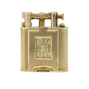 A RARE 9CT SOLID GOLD DUNHILL UNIQUE WATCH LIGHTER CIRCA 1930s, REF. 899 D: Silver dial with gilt