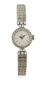 A LADIES 18K SOLID WHITE GOLD & DIAMOND OMEGA BRACELET WATCH CIRCA 1960 D: Silver dial with silver