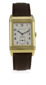 A GENTLEMAN'S 18K SOLID GOLD JAEGER LECOULTRE GRANDE TAILLE REVERSO WRIST WATCH CIRCA 1990s, REF.