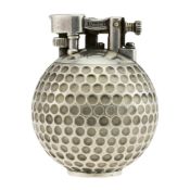 A SOLID SILVER DUNHILL UNIQUE "GOLF BALL" TABLE LIGHTER CIRCA 1970s C: "Golf ball" case, signed