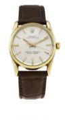 A RARE GENTLEMAN'S 14K SOLID GOLD ROLEX OYSTER PERPETUAL WRIST WATCH CIRCA 1963, REF. 1011 D: Silver