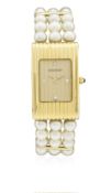 A LADIES 18K SOLID GOLD & PEARL BOUCHERON REFLET BRACELET WATCH CIRCA 1990s   D: Champagne dial with