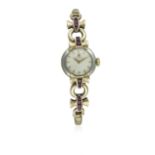 A LADIES 9CT TWO COLOUR SOLID GOLD & RUBY OMEGA BRACELET WATCH CIRCA 1961 D: Silver dial with gilt