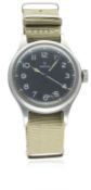 A GENTLEMAN'S STAINLESS STEEL BRITISH MILITARY RAF OMEGA PILOTS WRIST WATCH DATED 1956 D: Black dial