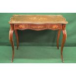 Rosewood and inlaid centre table having shaped top with brass border over single long shaped drawer,