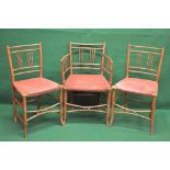 Set of five Regency simulated bamboo dining chairs having vertical and horizontal back rails over