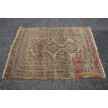 Brown ground rug with red and blue pattern - 39.5" x 52.