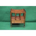 Late 20th century mahogany four section Canterbury having curved top,