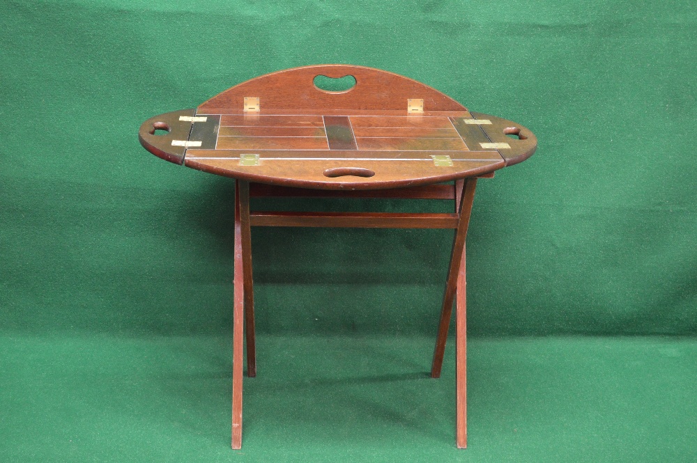 Late 20th century/early 21st century mahogany butlers tray of oval form having four drop sides with