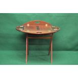 Late 20th century/early 21st century mahogany butlers tray of oval form having four drop sides with