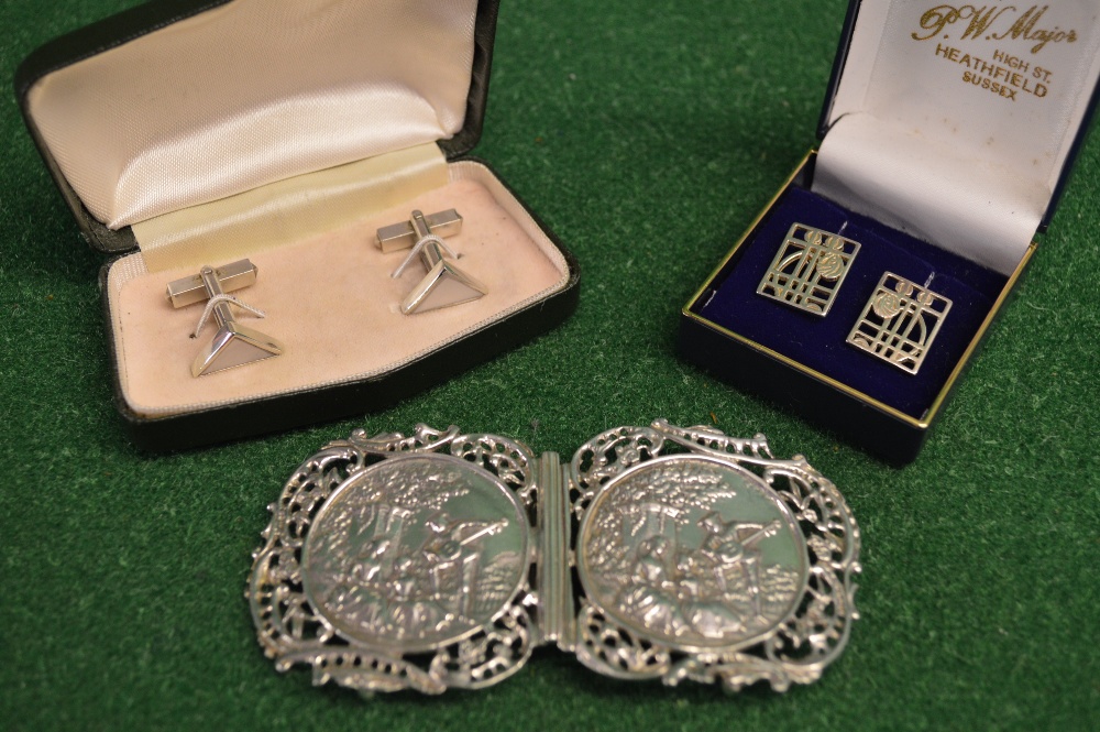 Quantity of silver items to comprise: highly decorative two piece buckle,