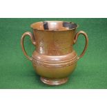 18th century earthenware glazed two handled loving cup inscribed William Hollinnorth and Sarah his