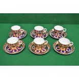 Six Royal Crown Derby Imari style patterned cups and saucers having orange back stamp