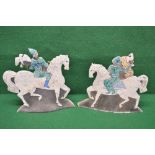 Pair of pottery double sided mantle figures in the form of figures holding birds on horseback and