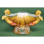 Majolica style table centre piece having shell formed bowl supported by two mermaids and standing