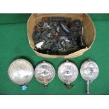 Box containing Lucas spot lamps together with other light fittings