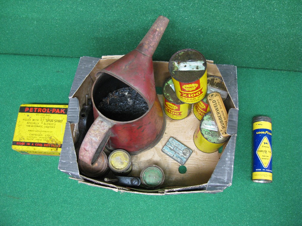 Box of four Shell 1pt X100 oil tins, a large red pourer, Goodyear Tyre repair tin, oil cans,