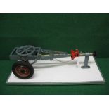 Large mounted model of a trailer chassis demonstrating coupling and brakes,