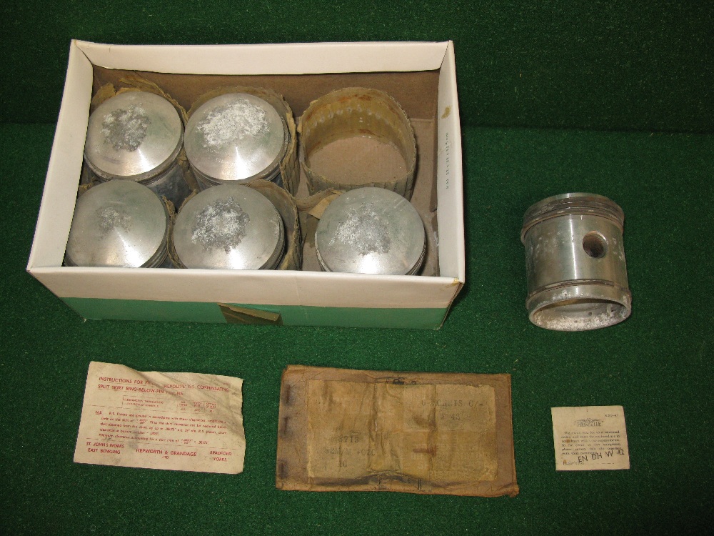 Six Hepolite pistons for a six cylinder Morris engine with packing paperwork labelled ENDH W 42