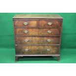 Mahogany chest of drawers having cross banded top over two short and three long graduated drawers