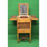 Inlaid mahogany night/wash stand having hinged top opening to reveal lift up mirror and basin,