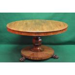 Circular rosewood tilt top breakfast table,