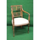 Good quality rosewood elbow chair having reeded top rail over a vertical pierced back and sweeping