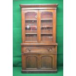 Victorian mahogany secretaire bookcase having rounded cornice over two glazed arched doors