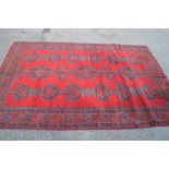 Red ground rug with blue,