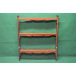 Set of Edwardian mahogany wall shelves having three shelves with shaped friezes,