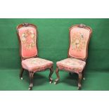 Pair of Victorian rosewood show wood framed high back nursing chairs having floral embroidered