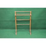 Ash towel rail having five turned spindle hanging rails supported by a moulded square frame with