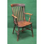 Elm stick back Windsor chair having curved top rail and vertical turned back spindles leading to a