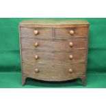 Mahogany bow fronted chest of five drawers having two short over three long graduated drawers with