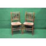 Set of six elm country chairs having turned top rails and back rails with vertical back splats,