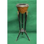 Inlaid and ebonised jardiniere having circular top with scrolled inlaid decoration supported on