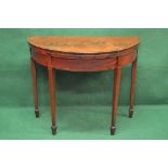 Mahogany demi lune fold over card table having cross banded top,