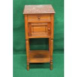 French satinwood pot cupboard having marbled top over single drawer and cupboard door with turned