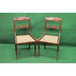 Set of six Regency dining chairs having carved top and back rails supported on reeded and twist