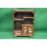 Oriental hardwood table cabinet having stepped shelves over single left hand drawer and two right