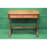 Rosewood stretcher table having rectangular top with rounded corners over a single long drawer,