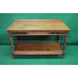 Oak two tier buffet/serving table having raised back over a three plank top with moulded edge,