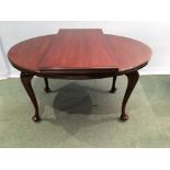 A Victorian Oval Mahogany Table