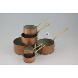 Set of Six Graduating Copper and Brass Handled Saucepans