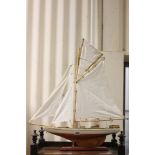 Model of Defender 1895 Yacht on Wooden Stand