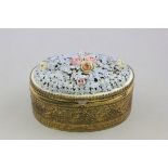 Gilt Metal Oval Box encrusted with ceramic flowers to lid