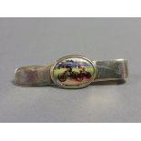 Silver tie/money clip with enamel panel depicting cyclists